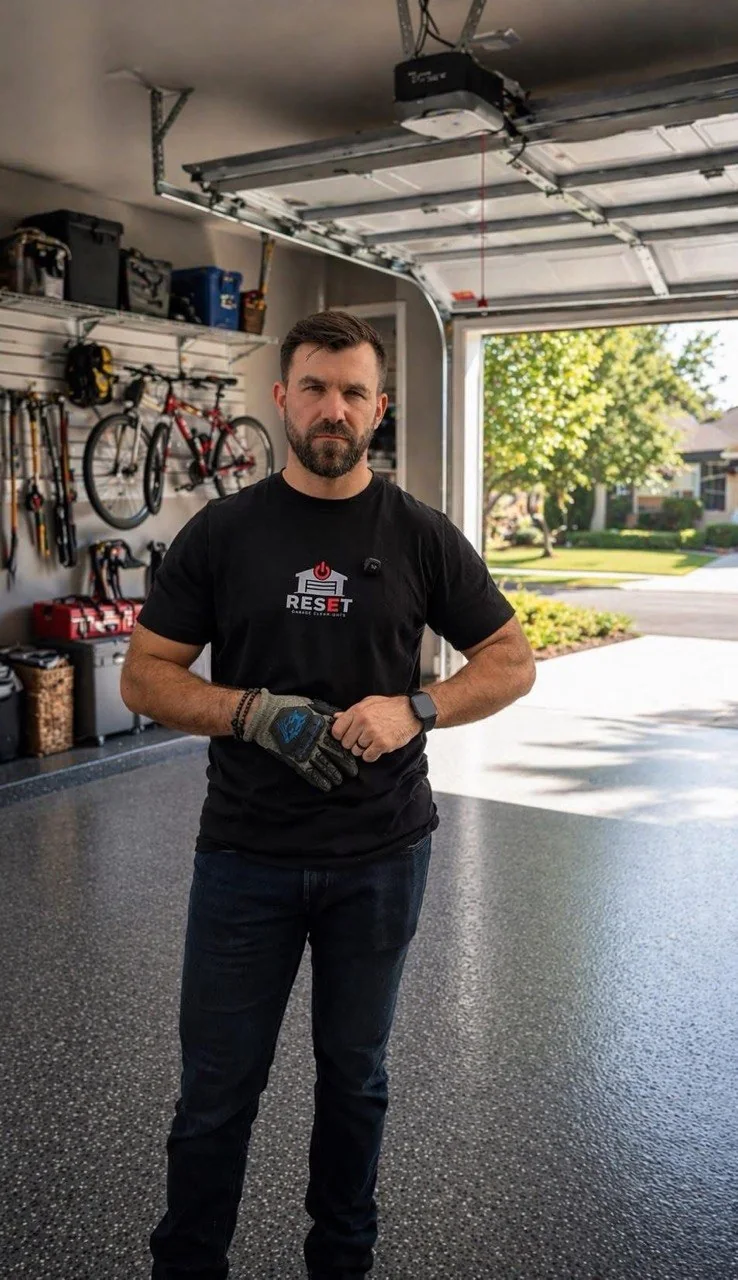 RESET crew member standing in a finished garage